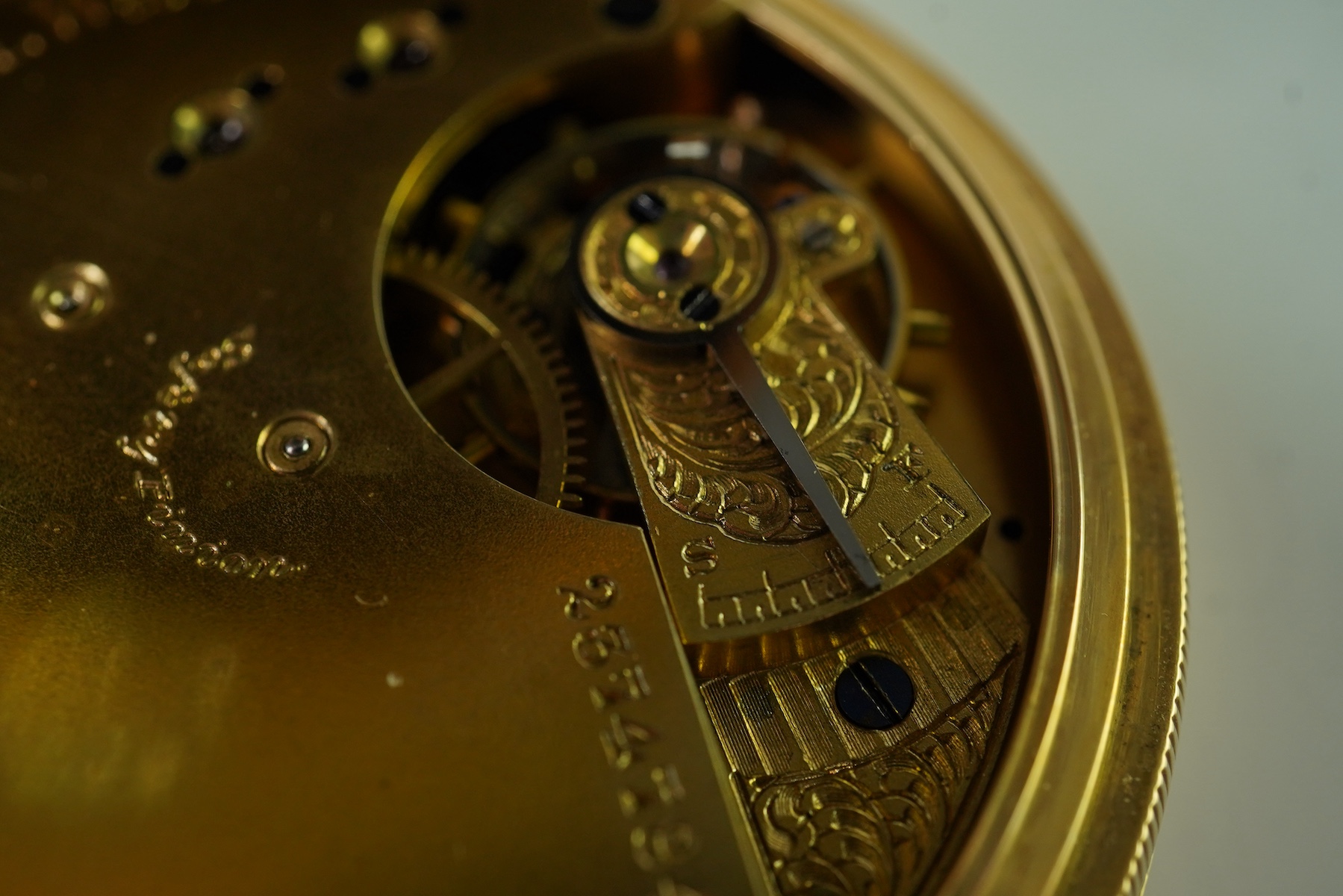 A late Victorian engine turned 18ct gold open faced keyless pocket watch by The American Waltham Watch Company